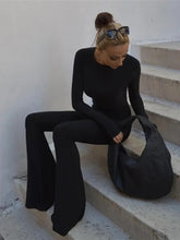 Indlæs billede til gallerivisning BACKLESS FITTED FLARED JUMPSUIT
